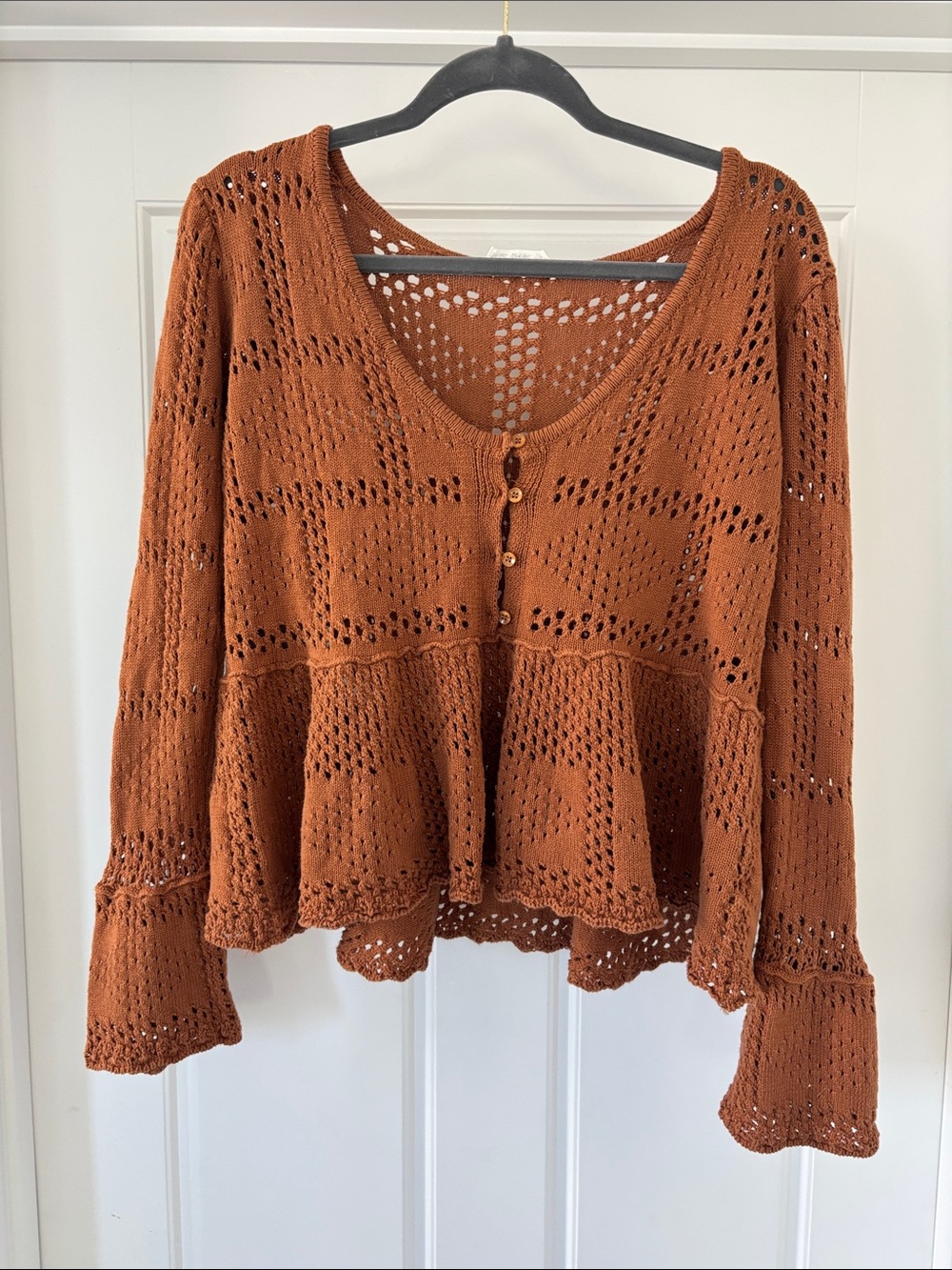 Open-Knit Peplum V-Neck Sweater in Rust
